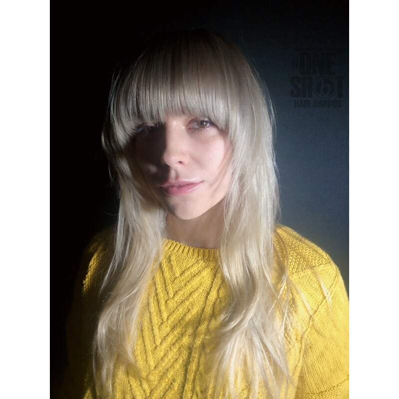 Shag haircut soft platinum blonde